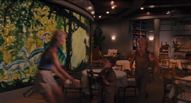 Wide shot frame from Jurassic Park — standing, walking, room