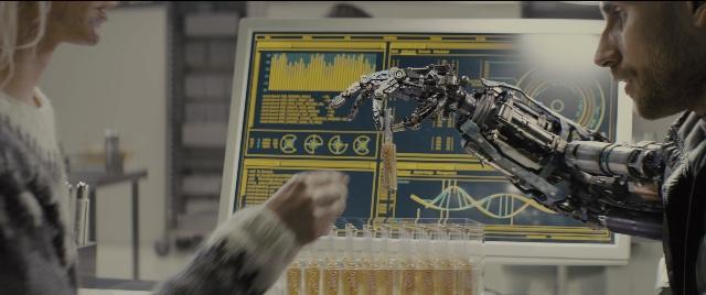 Wide shot frame from Kingsman: The Golden Circle — standing, table, person