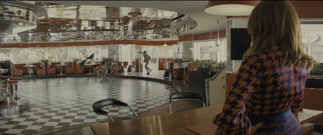 Wide shot frame from Kingsman: The Golden Circle — standing, walking, room