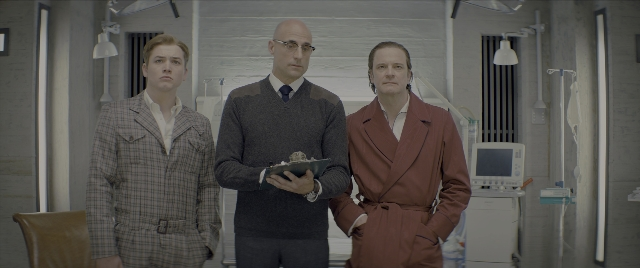 Wide shot frame from Kingsman: The Secret Service — standing, room, suit
