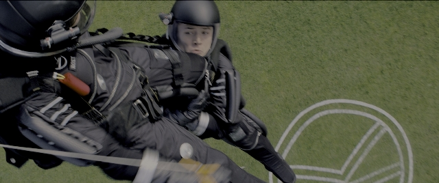 Wide shot frame from Kingsman: The Secret Service — people, action, show