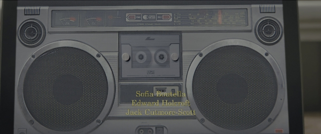 Wide shot frame from Kingsman: The Secret Service — washing machine