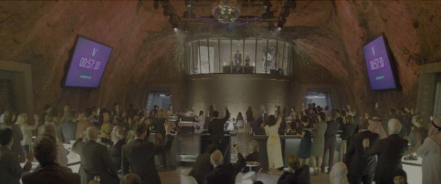 Wide shot frame from Kingsman: The Secret Service — room, table, food