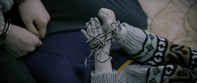 Wide shot frame from Chinjeolhan Geumjassi — sitting, bed, hand