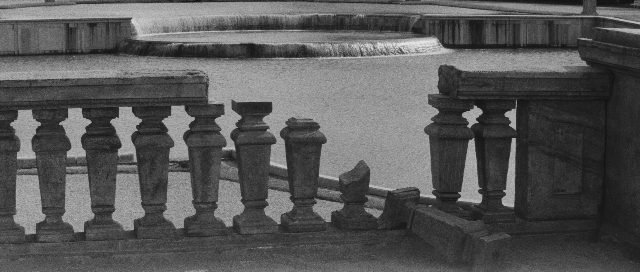 Wide shot frame from L'année dernière à Marienbad — water, fountain