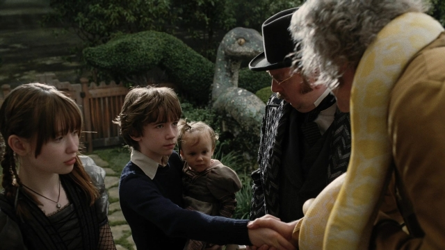 Wide shot frame from A Series of Unfortunate Events — people, action, standing