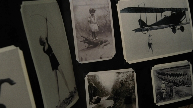 Wide shot frame from A Series of Unfortunate Events — standing, hat, dress