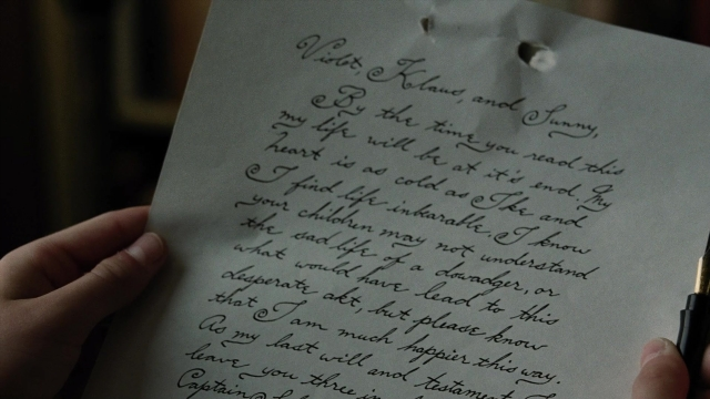 Frame from A Series of Unfortunate Events — room, hand, penguin