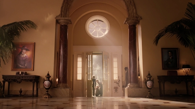 Wide shot frame from A Series of Unfortunate Events — room, table, door