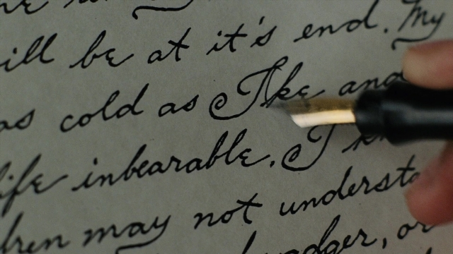 Frame from A Series of Unfortunate Events — hand, penguin, person