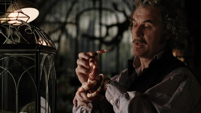 Wide shot frame from A Series of Unfortunate Events — standing, hand, shirt