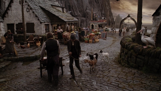 Wide shot frame from A Series of Unfortunate Events — sitting, walking, street