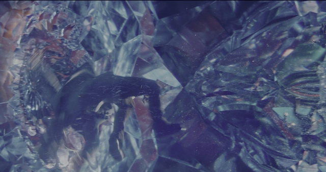 Wide shot frame from Doctor Strange — animal, glass