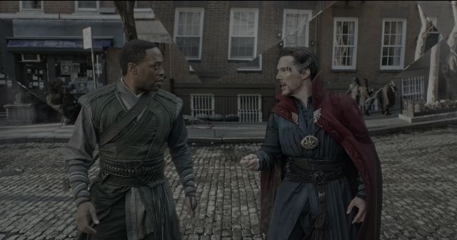 Wide shot frame from Doctor Strange — standing, walking, dialogue