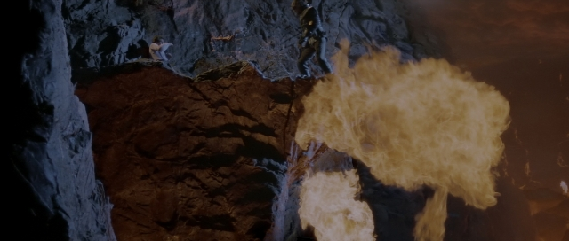 Wide shot frame from Star Trek III: The Search for Spock — standing, fire, smoke