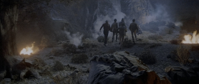 Wide shot frame from Star Trek III: The Search for Spock — walking, fire, person