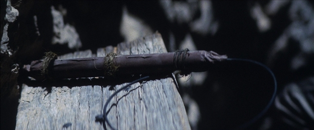 Wide shot frame from There Will Be Blood — umbrella