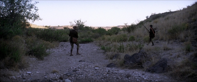 Frame from There Will Be Blood — walking, person