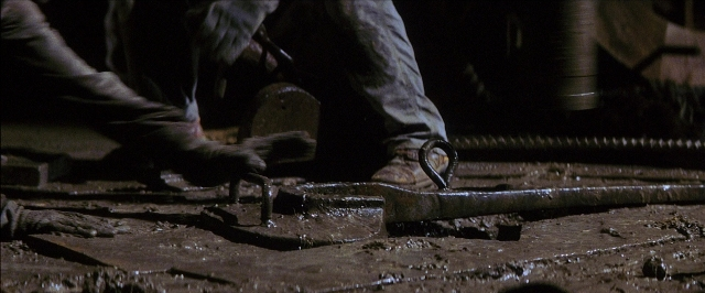 Wide shot frame from There Will Be Blood — person, footwear