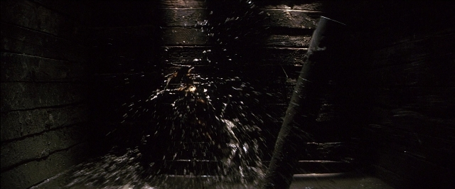 Wide shot frame from There Will Be Blood — water, fountain
