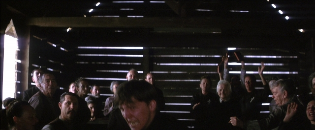 Wide shot frame from There Will Be Blood — standing, room, person