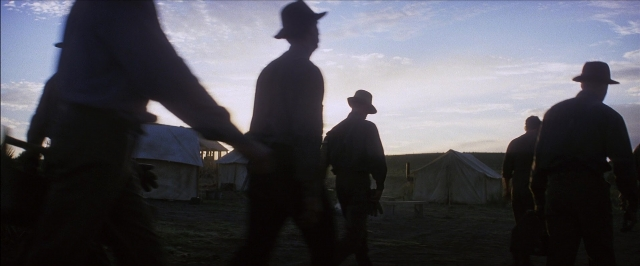 Wide shot frame from There Will Be Blood — standing, person