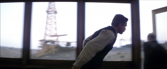 Wide shot frame from There Will Be Blood — standing, walking, person