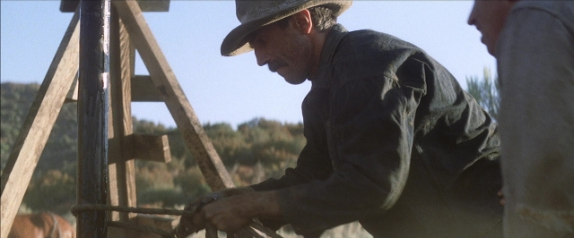 Frame from There Will Be Blood — hat, person, human face