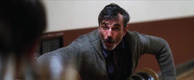 Frame from There Will Be Blood — room, dialogue, beard
