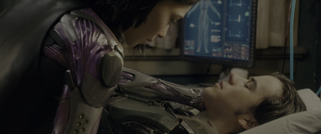 Wide shot frame from Alita: Battle Angel — standing, bed, suit