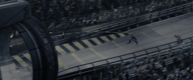 Frame from Alita: Battle Angel — bicycle, person