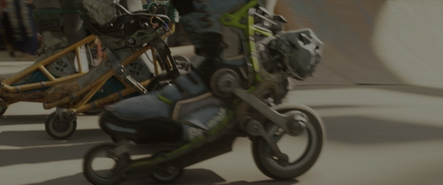 Wide shot frame from Alita: Battle Angel — walking, street, uniform