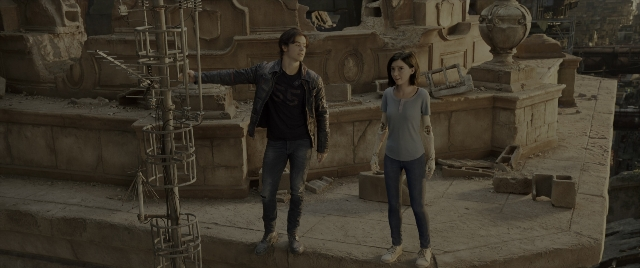 Wide shot frame from Alita: Battle Angel — standing, bird, person