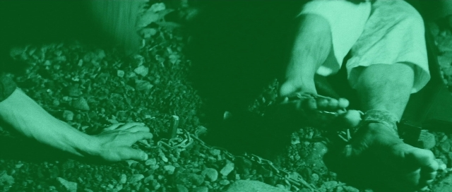 Wide shot frame from Kyôfu kikei ningen: Edogawa Rampo zenshû — bed, shirt, person