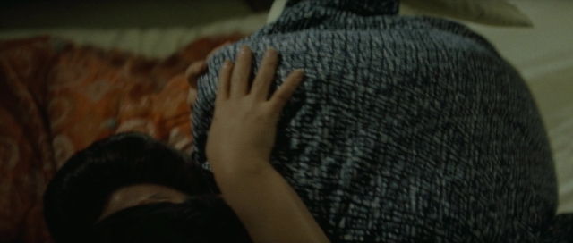Wide shot frame from Kyôfu kikei ningen: Edogawa Rampo zenshû — bed, bedroom, face