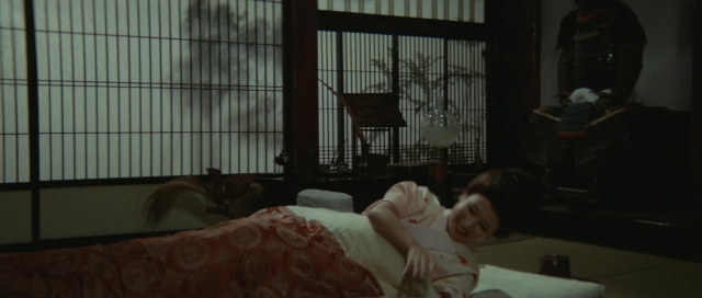 Wide shot frame from Kyôfu kikei ningen: Edogawa Rampo zenshû — room, bed, chair