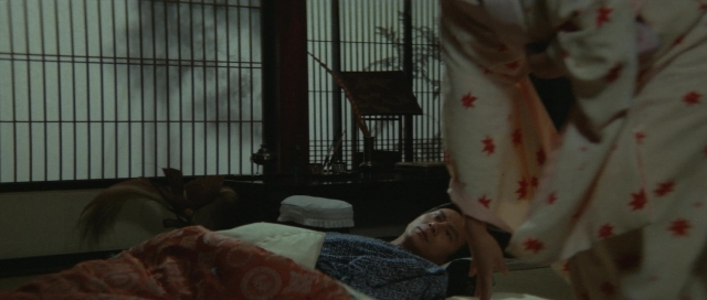 Wide shot frame from Kyôfu kikei ningen: Edogawa Rampo zenshû — room, table, bed
