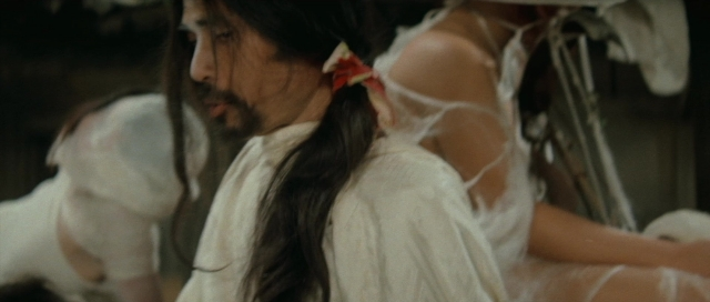 Frame from Kyôfu kikei ningen: Edogawa Rampo zenshû — sitting, room, bed