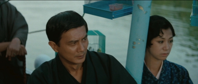 Medium shot frame from Kyôfu kikei ningen: Edogawa Rampo zenshû — sitting, water, face