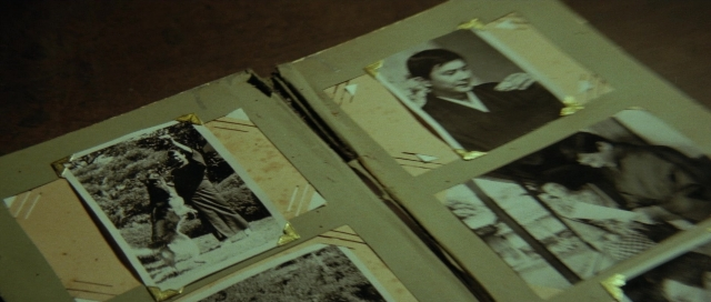 Wide shot frame from Kyôfu kikei ningen: Edogawa Rampo zenshû — walking, bed, dog