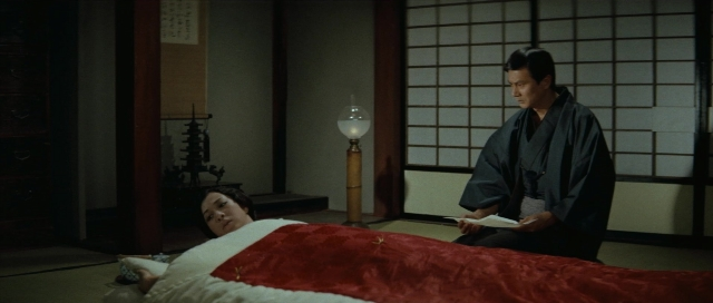 Wide shot frame from Kyôfu kikei ningen: Edogawa Rampo zenshû — book, room, bed