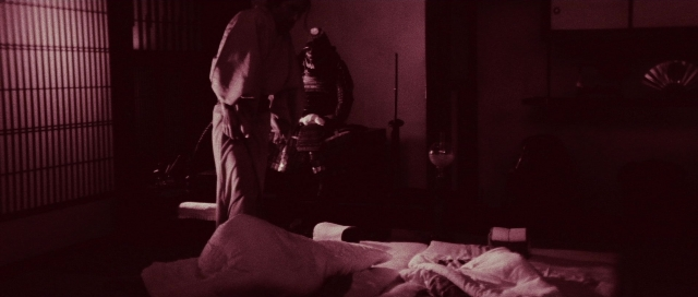 Wide shot frame from Kyôfu kikei ningen: Edogawa Rampo zenshû — standing, room, bed