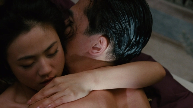 Wide shot frame from Se, jie — bed, shirt, bedroom