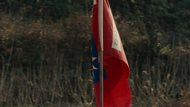 Wide shot frame from Se, jie — flag