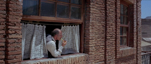 Per qualche dollaro in più — film still