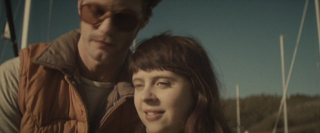 Medium shot frame from The Diary of a Teenage Girl — standing, shirt, water