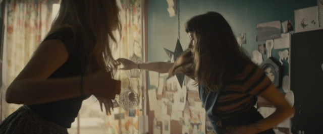Frame from The Diary of a Teenage Girl — standing, room, dialogue