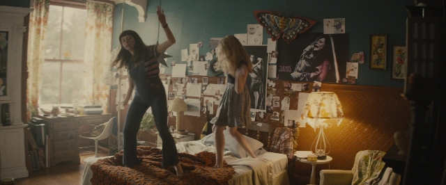 Wide shot frame from The Diary of a Teenage Girl — standing, room, bed