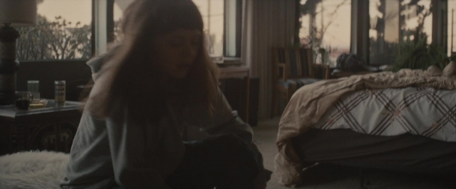 Frame from The Diary of a Teenage Girl — sitting, room, table