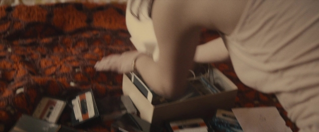 Wide shot frame from The Diary of a Teenage Girl — bed, shirt, person
